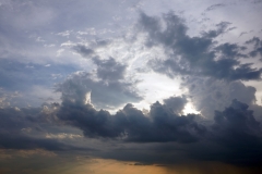 negative-space-dramatic-storm-clouds-sunlight